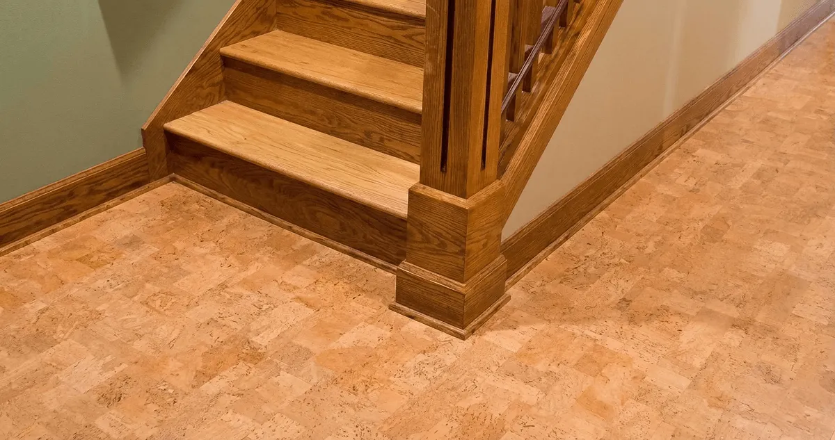 End of a staircase with cork flooring in Denver, CO